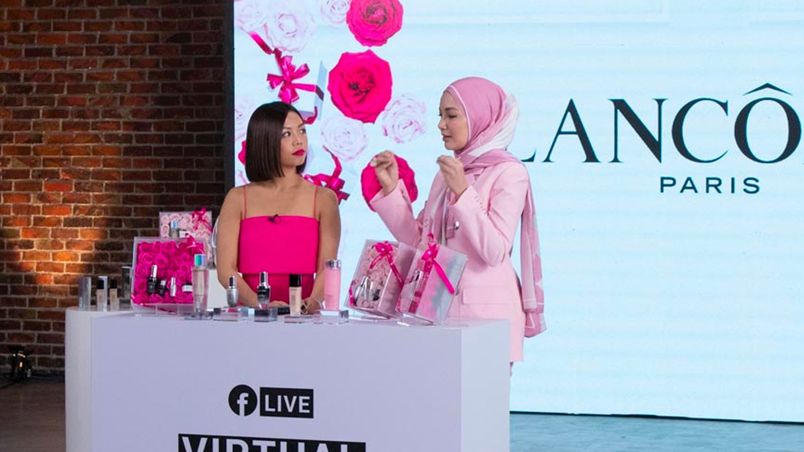 L’Oréal Facebook live - two women standing at Facebook live counter