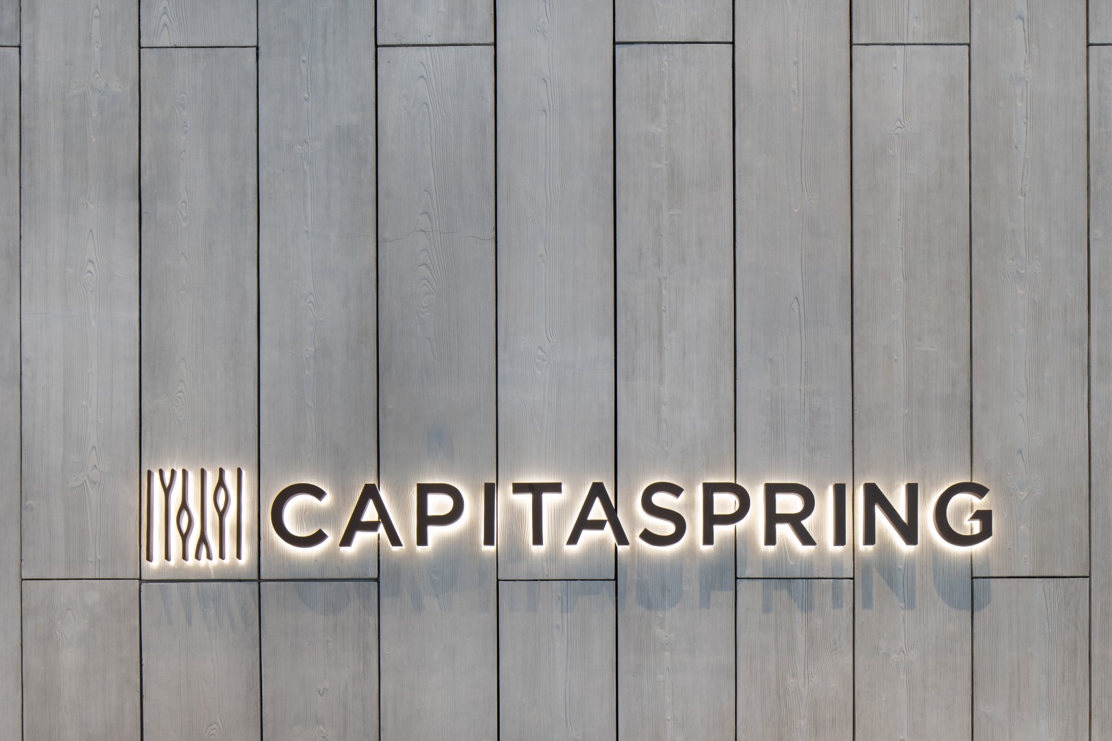 CapitaSpring logo on side of building