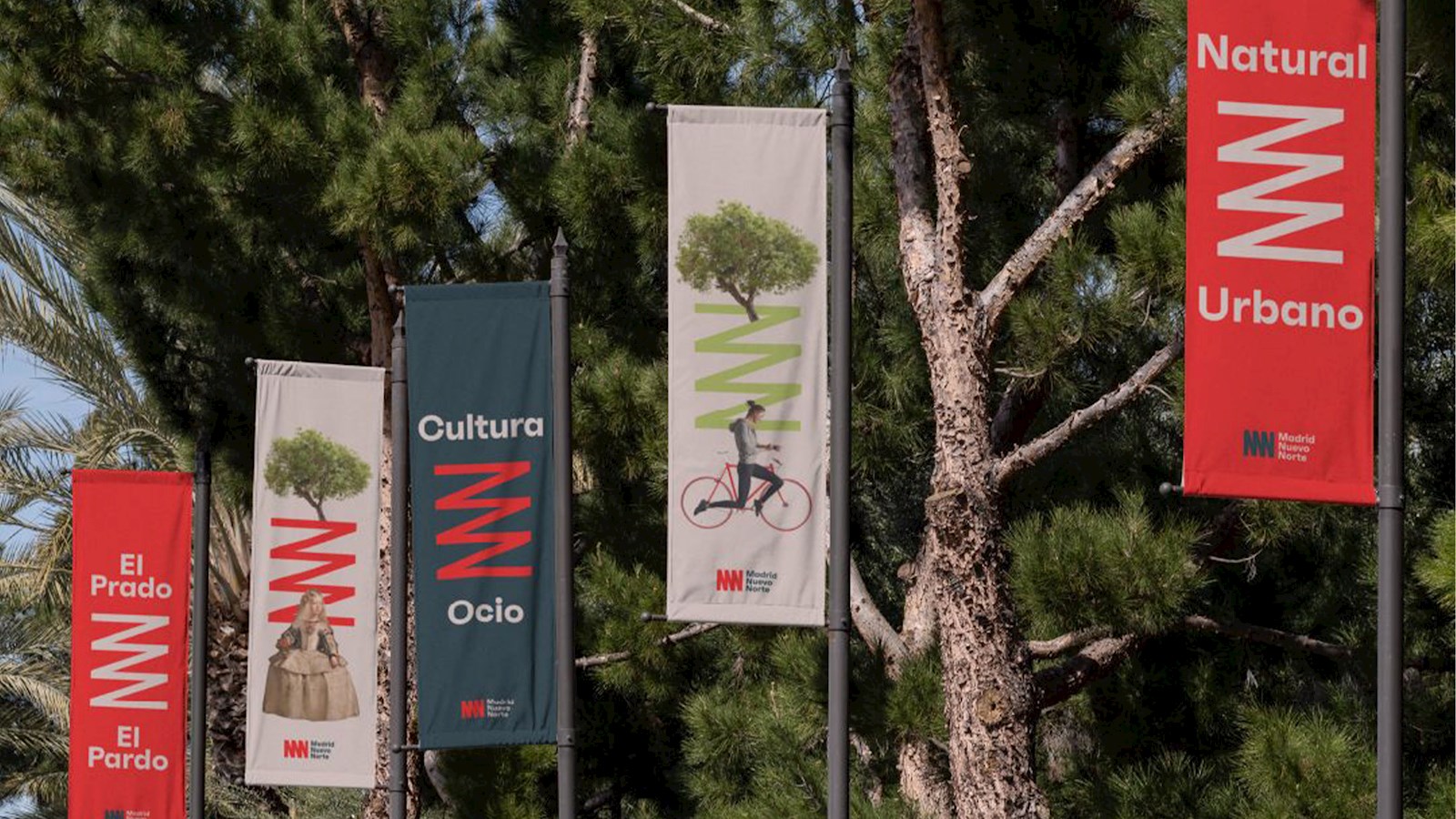 Flags showing the images from the Madrid rebrand