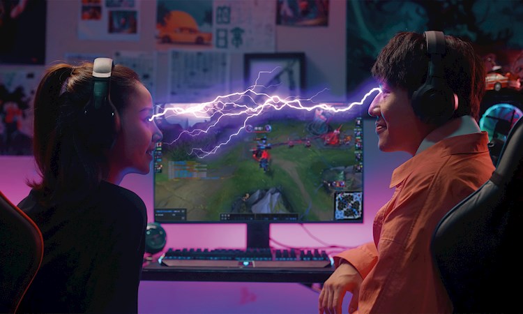 Gamers with lightening bolt between them 