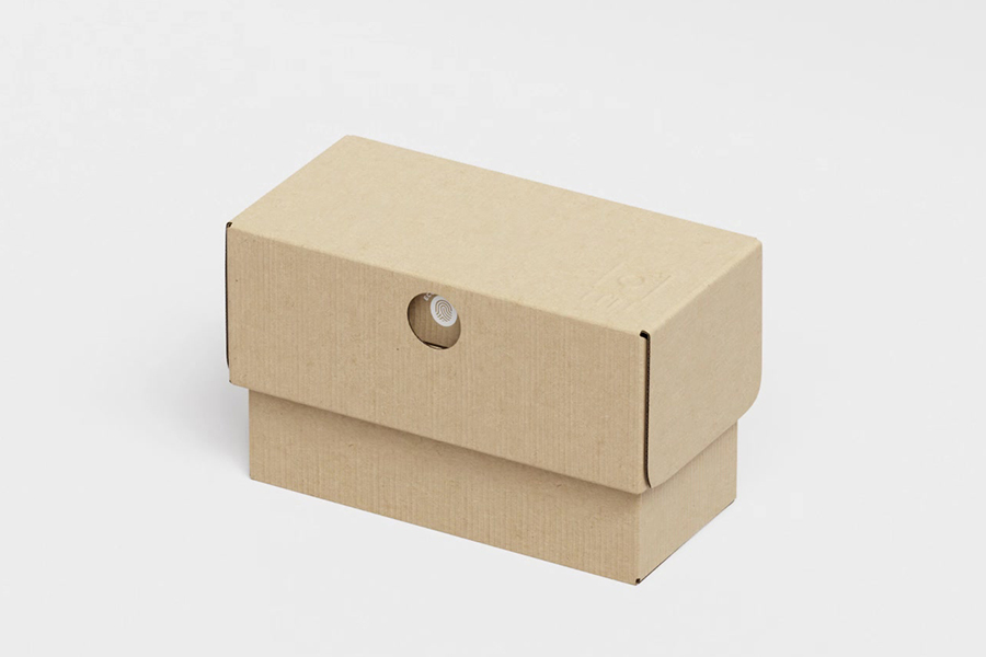 ECOCLIC cardboard box prototype on a light background