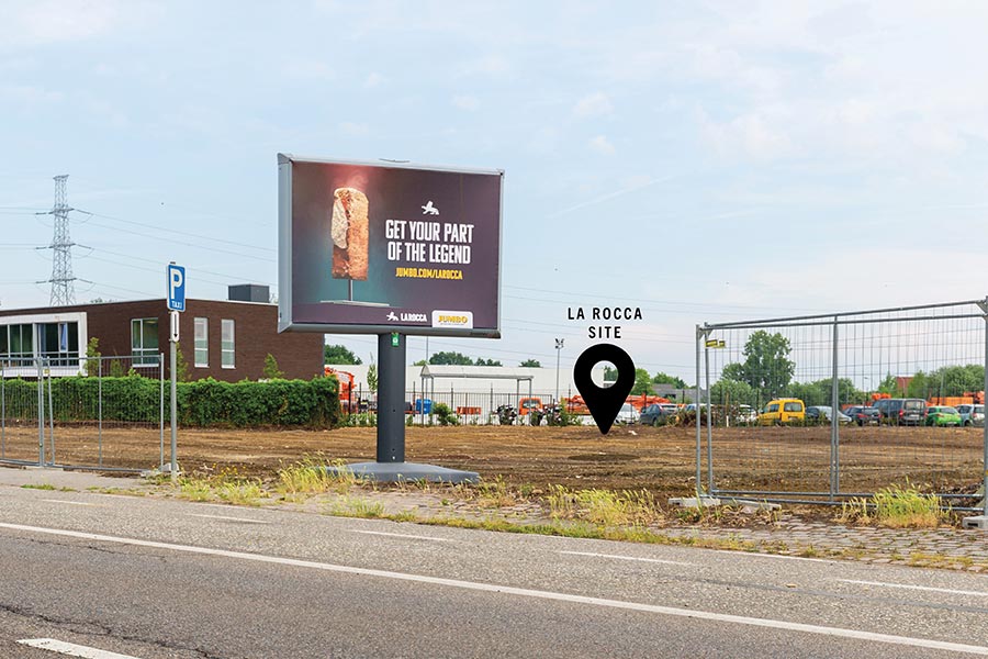 Billboard outside the building site on the former place where the La Rocca nightclub stood