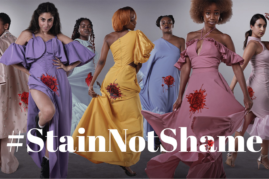 Models wearing clothes with stains on and the #StainNotShame