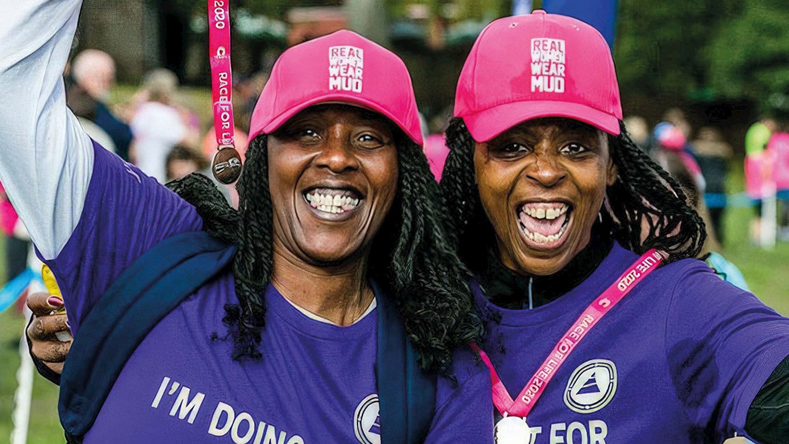 Two women celebrating at Race for Life