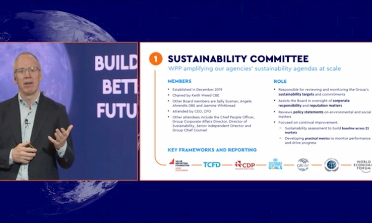 John Rogers CFO at WPP talking with a slide on the right which is titled Sustainability Committee