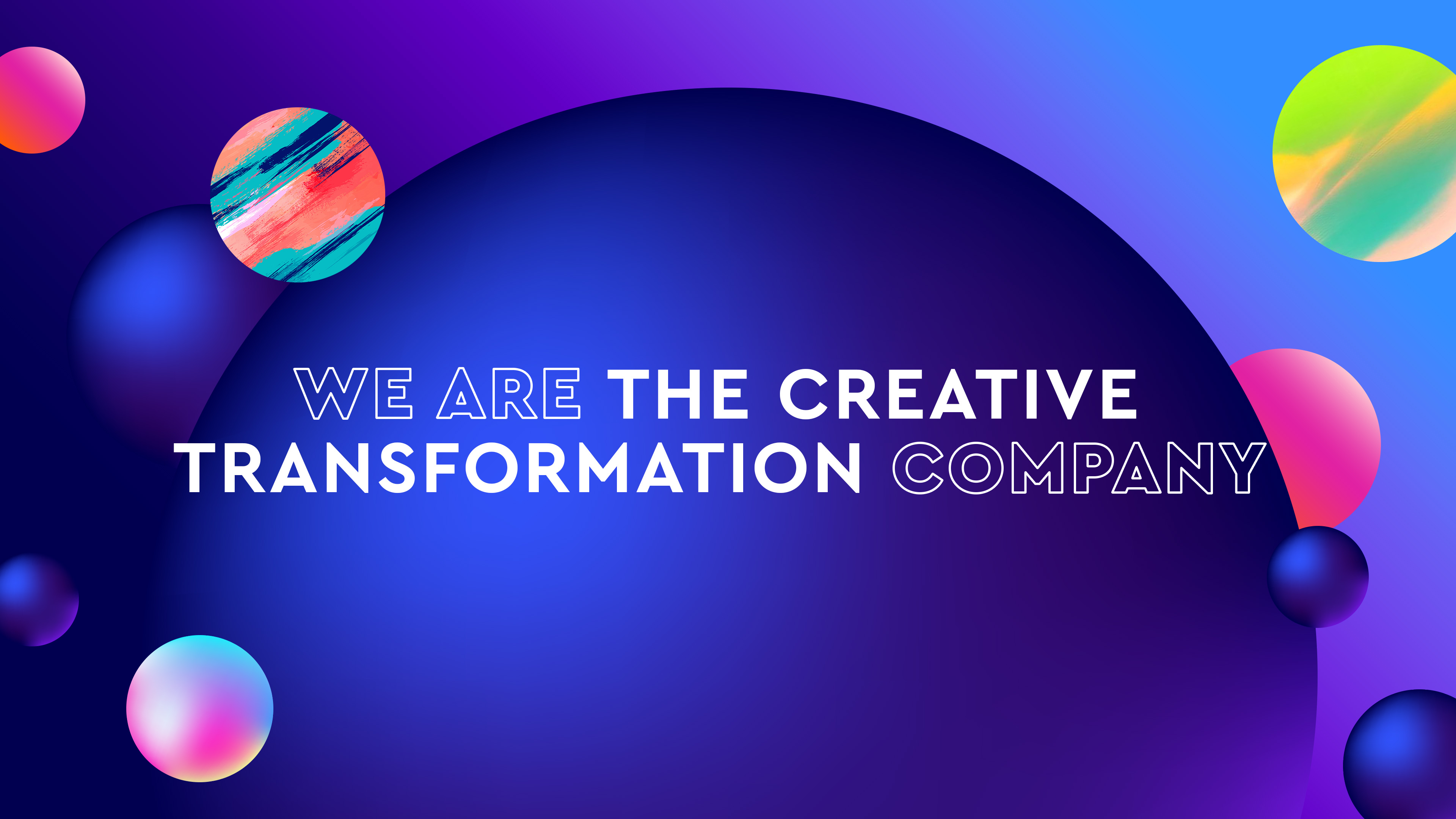 Blue background with colourful orbs with text that reads 'We are the creative transformation company'