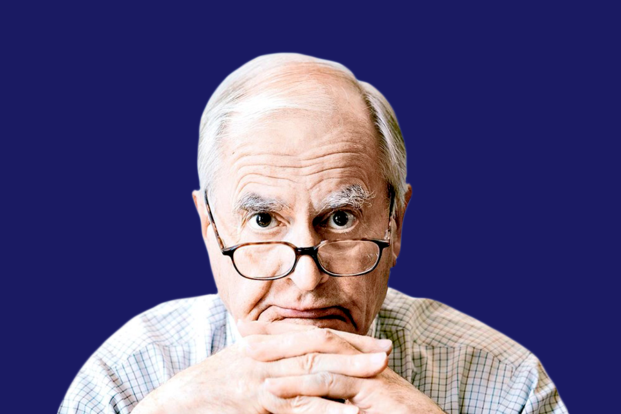 Headshot of Jeremy Bullmore on blue background