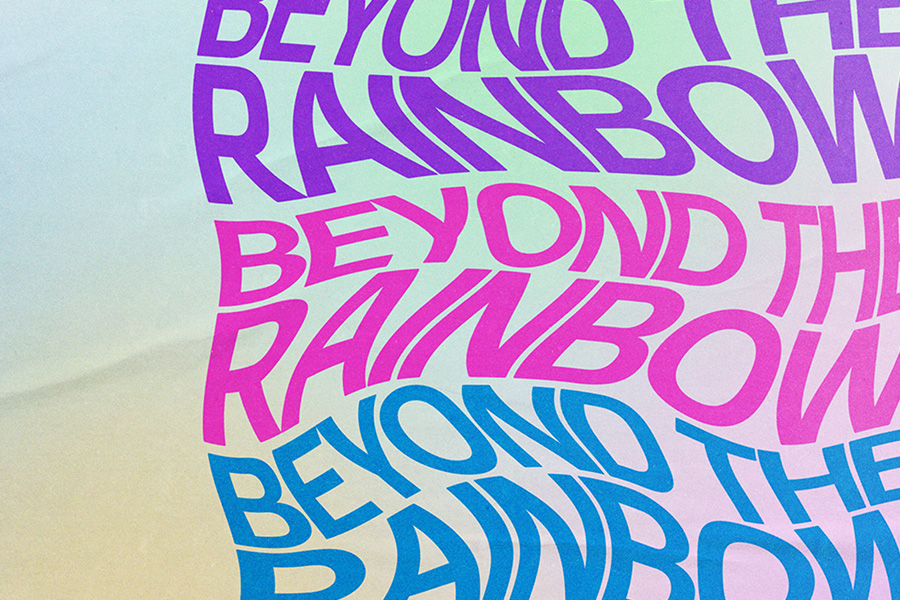 "Beyond the Rainbow" in swirly font repeated three times