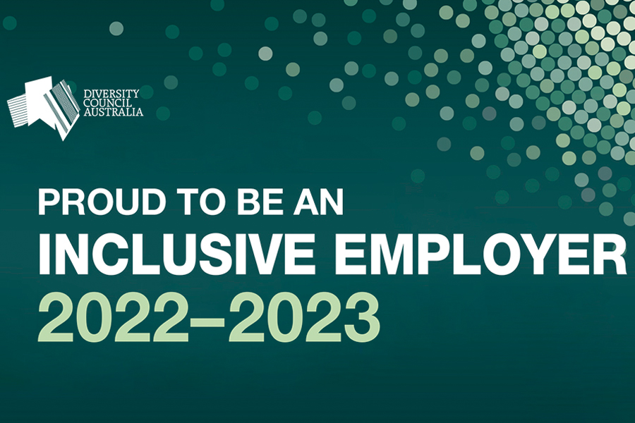 Green background with "Proud to be an inclusive employer 2022-2023"