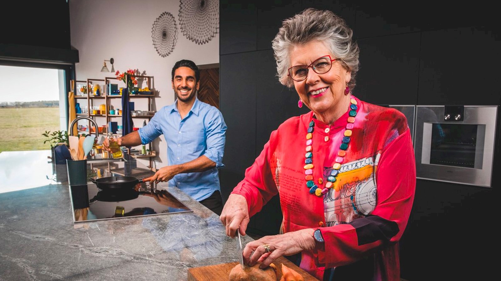 Image of Prue Leith and NHS GP and food expert Dr Rupy Aujla in a kitchen