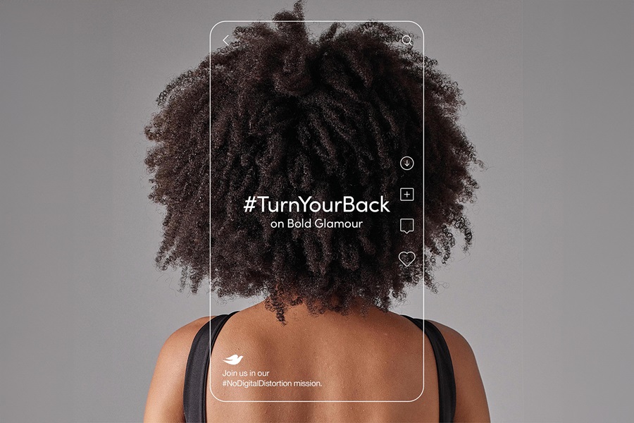 Woman with back turned to camera with outline of screen and text that reads #TurnYourBack