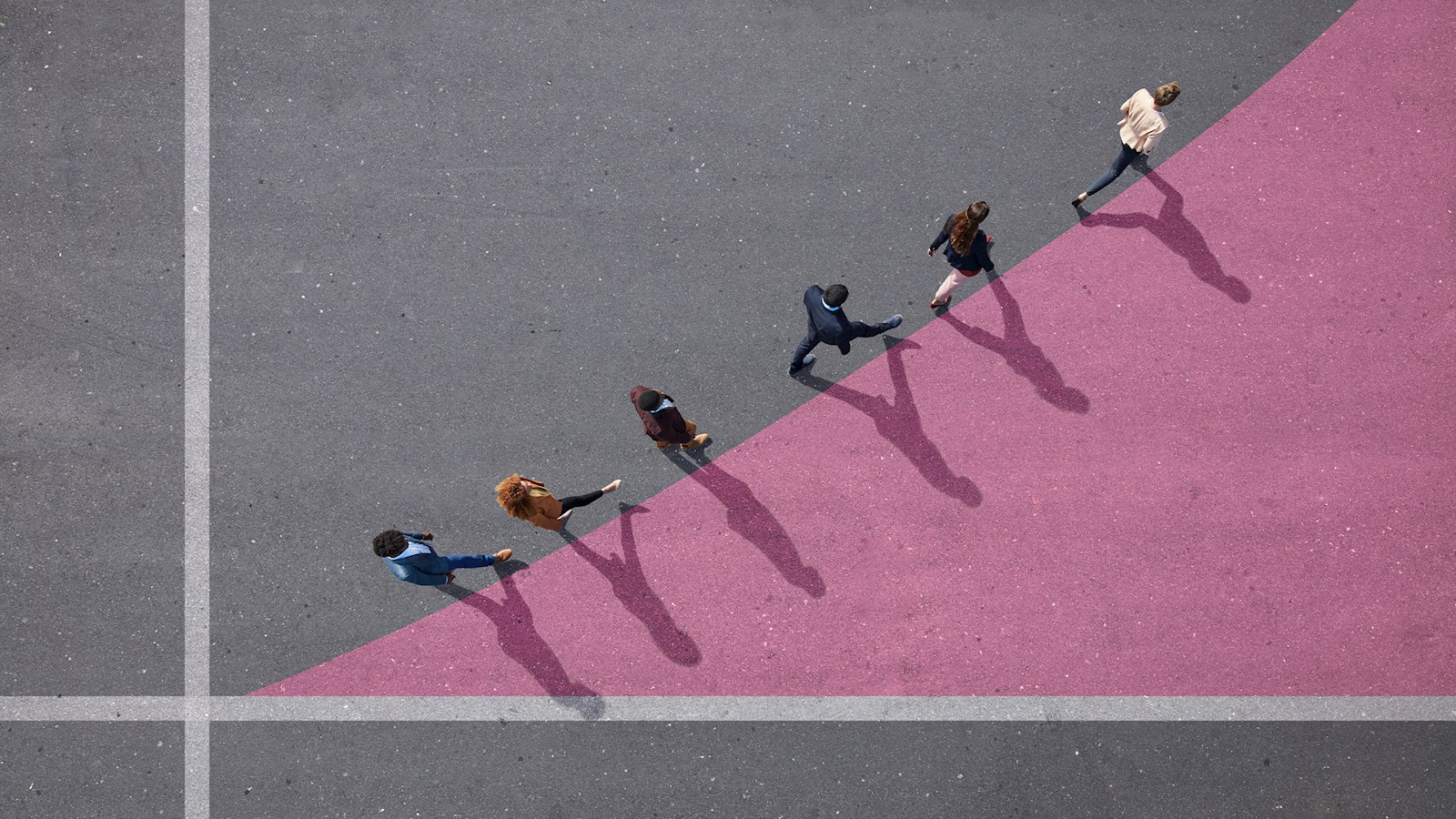 Businesspeople walking on painted up going graph, on asphalt