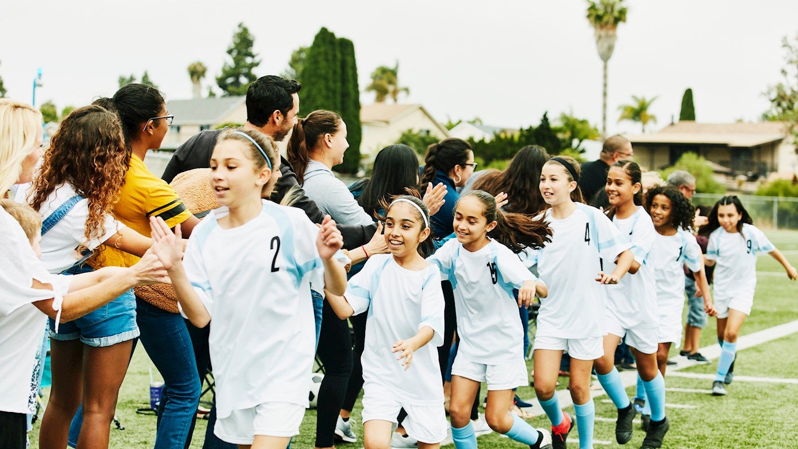 Team Girls building strong women of the future through sport, group sport 