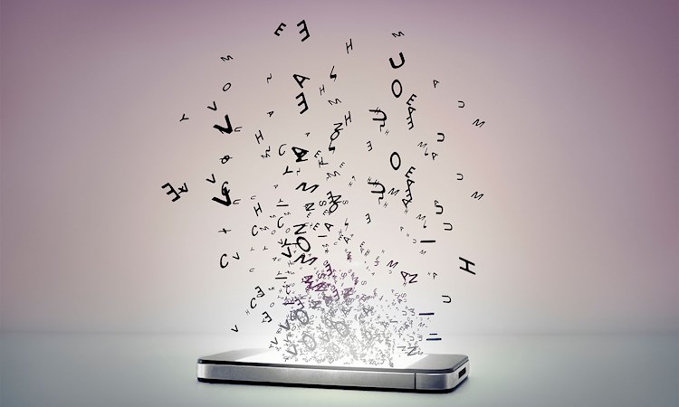 letters falling into smartphone