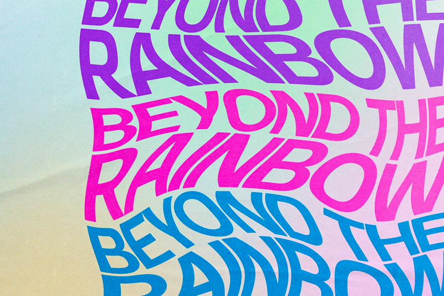 Multi-coloured background with the words "Beyond the Rainbow" in swirly writing repeated three times