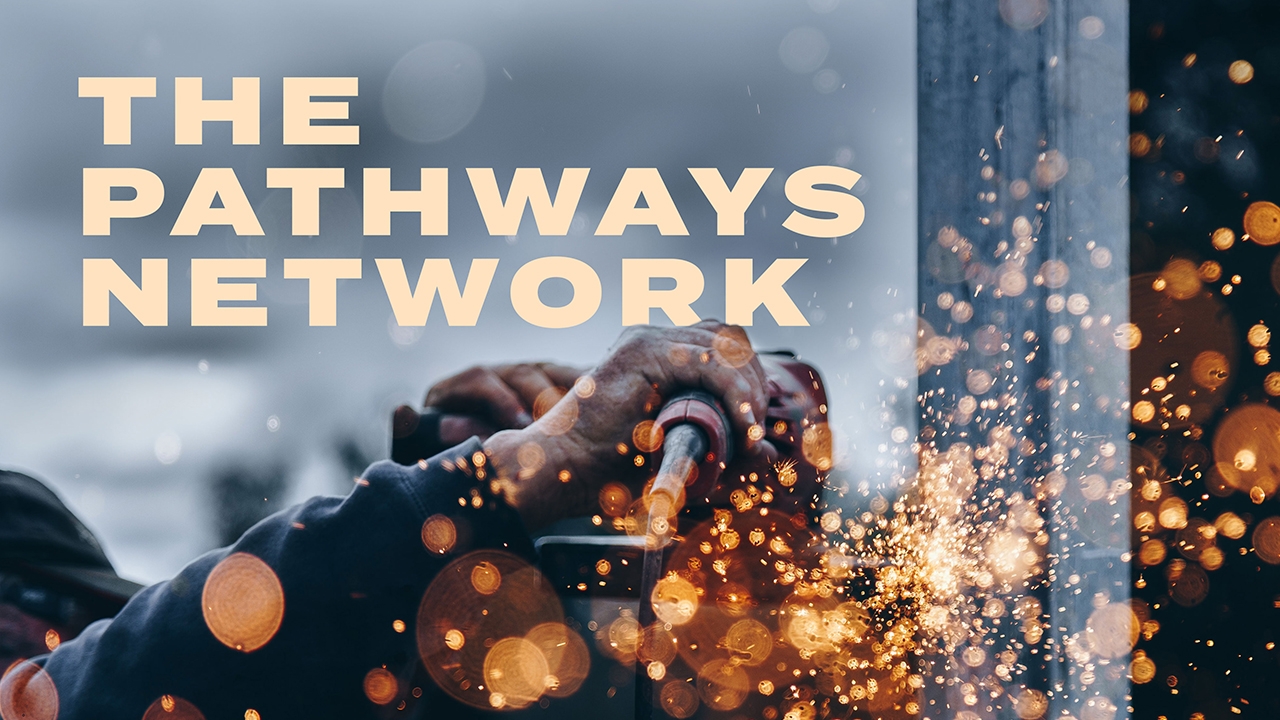 Image of hands and sparks flying with the text "The Pathways Network" overlaid
