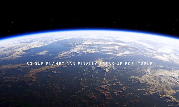 Image of the edge of the Earth with text overlaid "So our plant can finally speak up for itself"